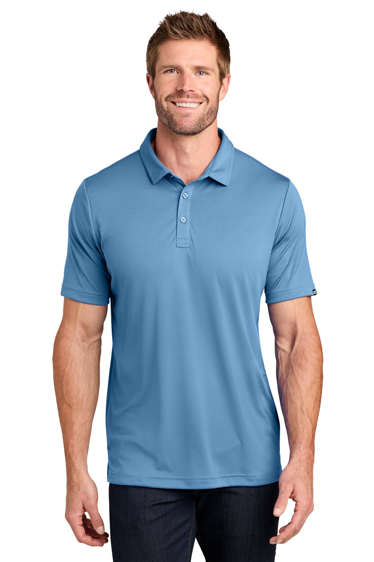 TravisMathew Coto Performance Polo. TM1MU410 - EMBROIDERED