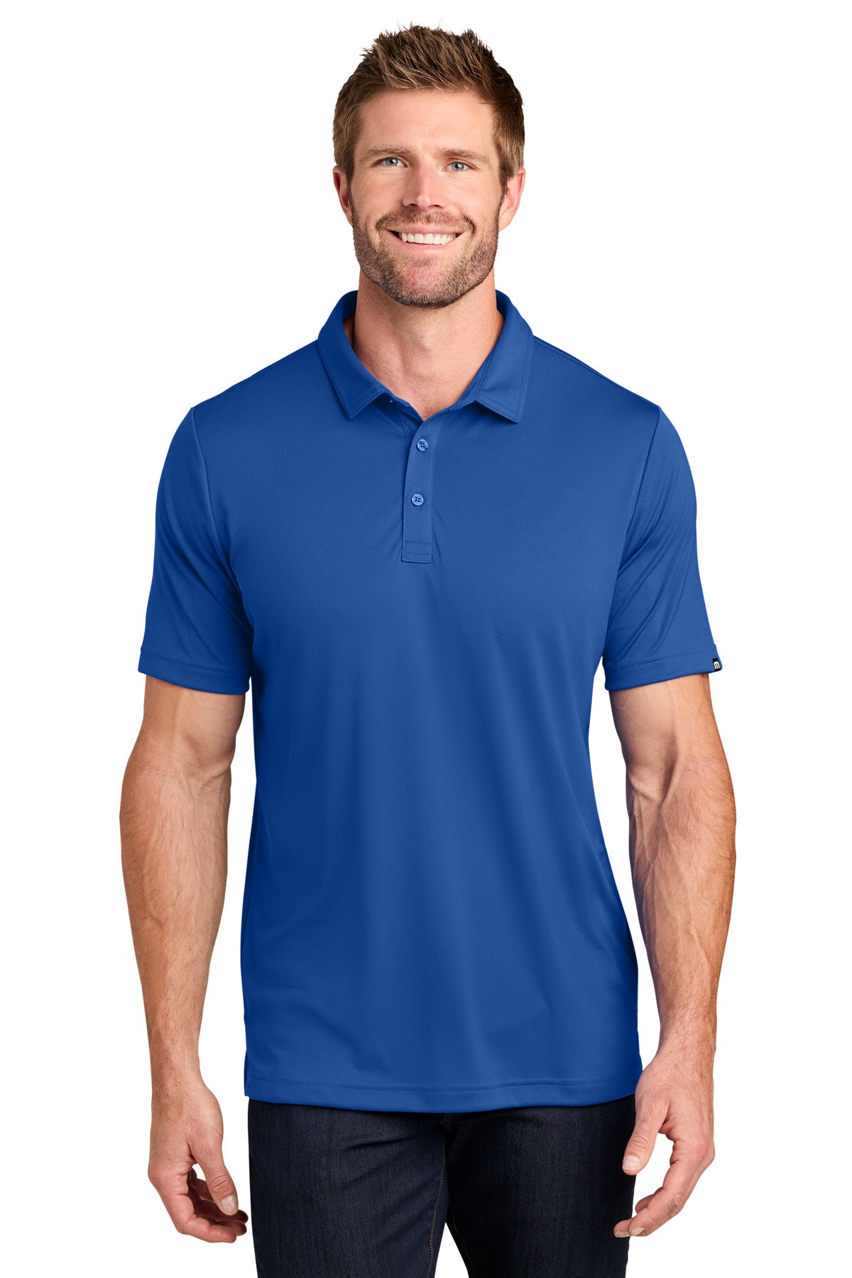 TravisMathew Coto Performance Polo. TM1MU410 - EMBROIDERED